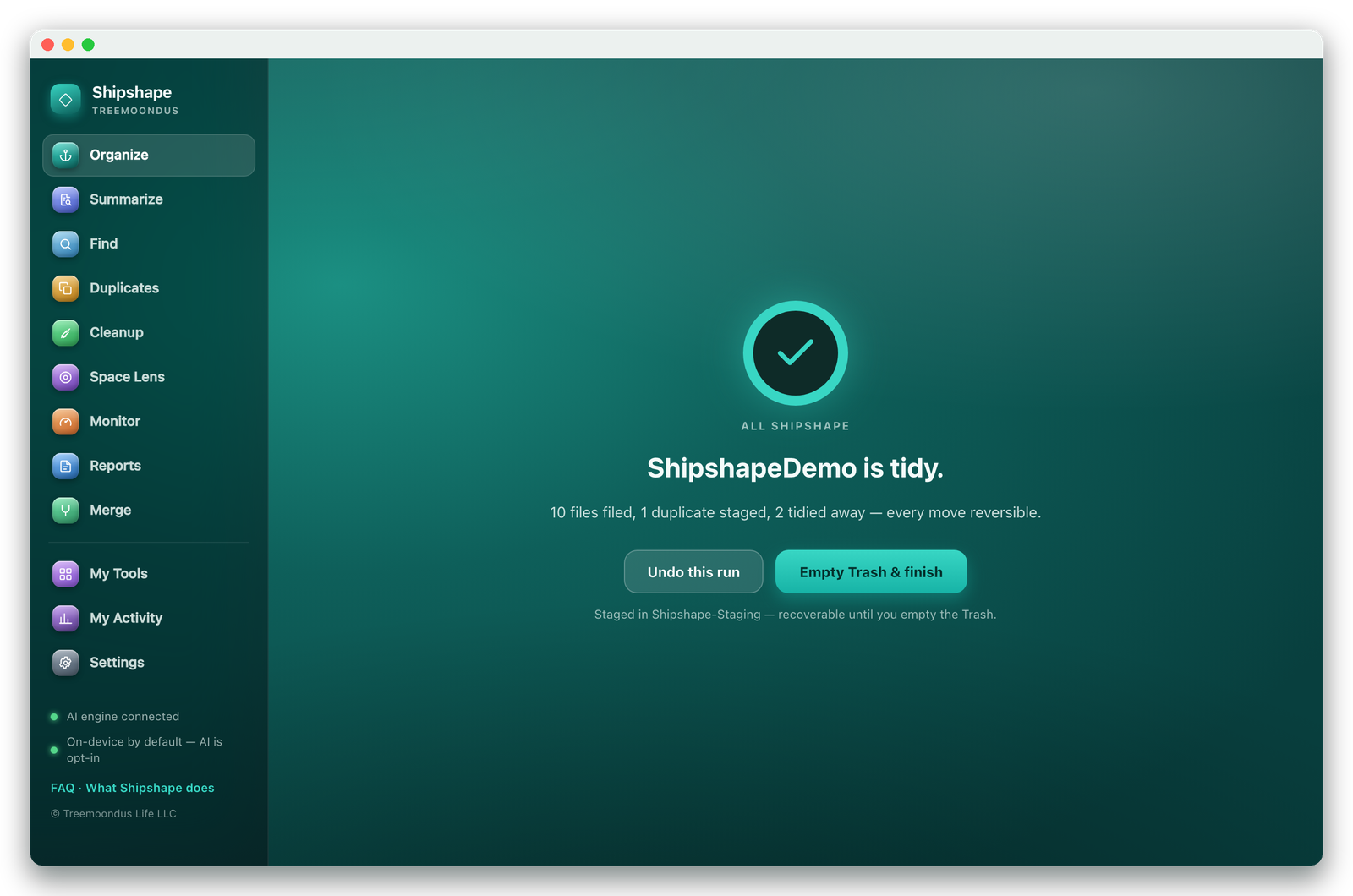 Done screen: 10 files filed, 1 duplicate staged, 2 tidied away — every move reversible, with an Undo button
